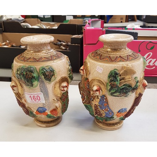 160 - A Pair of Satsuma Style Vases depicting figures of the Immortals. Height: 20cm (2)