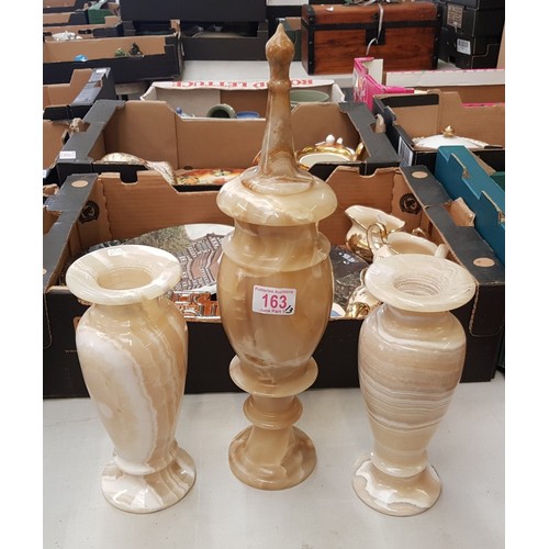 163 - Three Piece Onyx Garniture Vases to include Central Lidded Example. Height of Tallest: 45cm