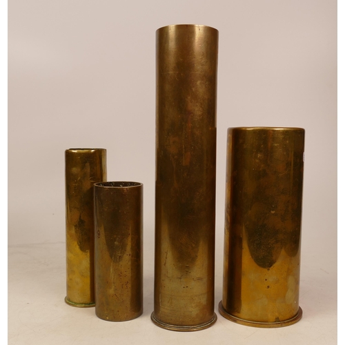 247 - Four WWII brass trench art shell cases. Height of tallest 26cm (4)