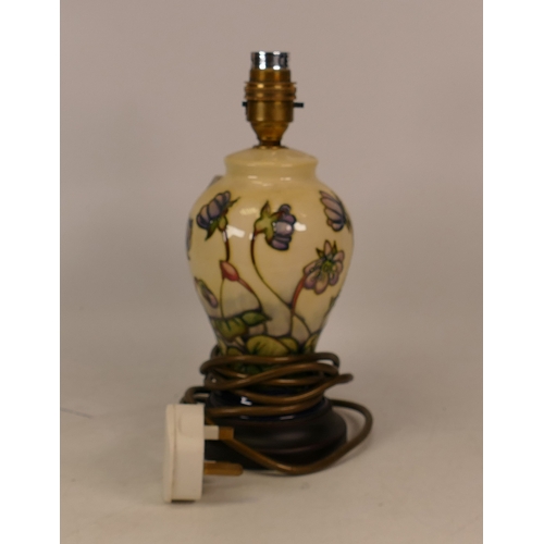 251 - Moorcroft hepatica lamp base. Height to fitting 19cm. Crazing