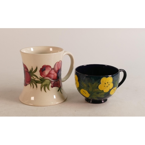 254 - Moorcroft Anemone tankard together with Buttercup patterned tea cup (2)