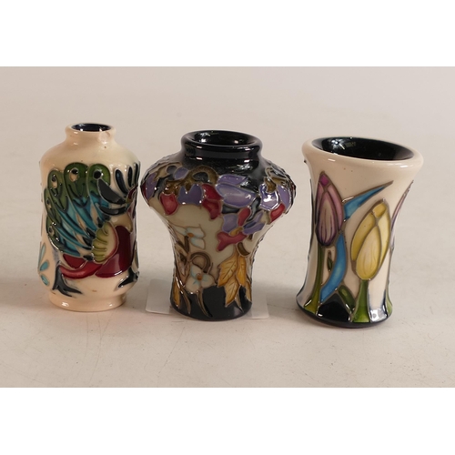 261 - Three small Moorcroft vases in the patterns Fit for a Queen, Proud Peacock (red dot seconds) and Cro... 