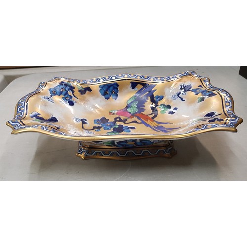 585 - A Keeling's Lo Sol Parrot design blue flow footed fruit bowl in shaped rectangular form.