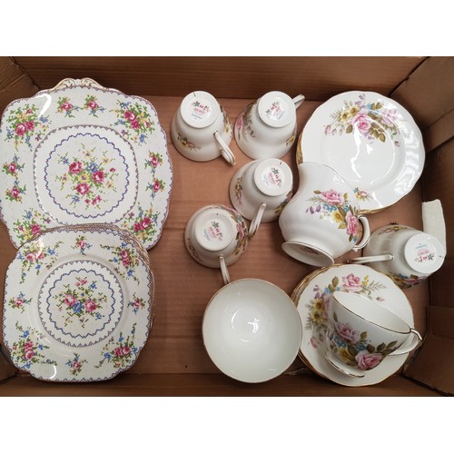 593 - A Duchess 'Summer' pattern tea set consisting of 6 trios, milk jug and sugar bowl, together with Roy... 