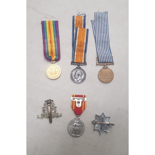 149 - A group of military service medals consisting of a 1914-1919 medal together with a 1914-1918 medal, ... 