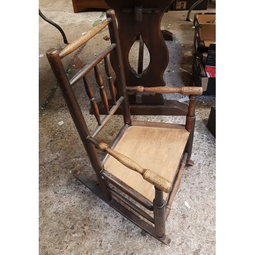 617 - Early 20th century child's rocking chair with historic repairs