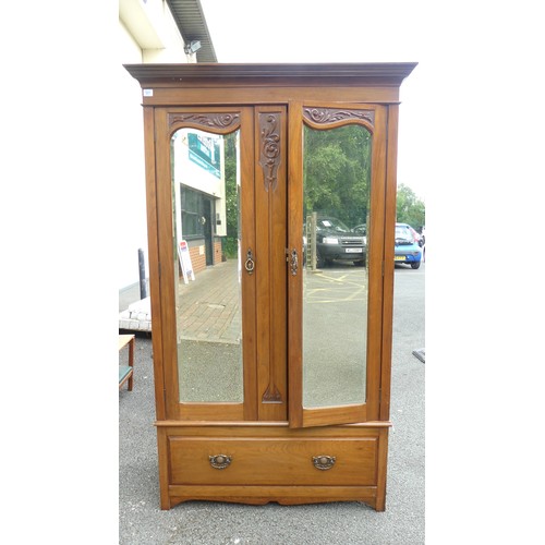 607 - An Art Nouveau Wardrobe with Mirrored Doors. Height: 199cm