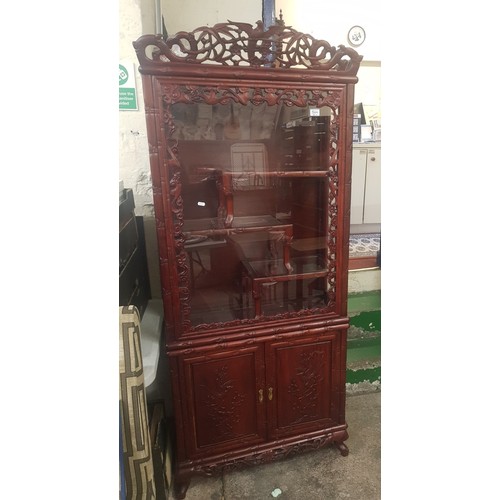 599 - Mid Century carved Rosewood Display cabinet with 2 doors below & staggered internal glass shelves wi... 