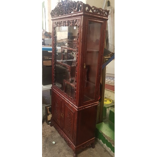 599 - Mid Century carved Rosewood Display cabinet with 2 doors below & staggered internal glass shelves wi... 