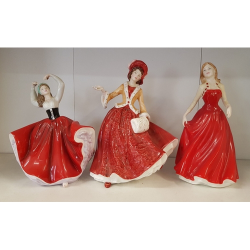 320 - Three Royal Doulton Lady Figures to include Christmas Day HN4214, Megan HN4790 and Karen HN4779 (3)