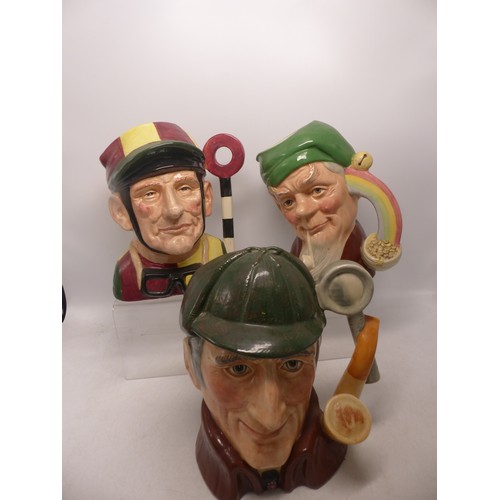 327 - Three Royal Doulton Character Jugs to include Jockey D6625, The Sleuth D6631 (seconds) and Leprechau... 