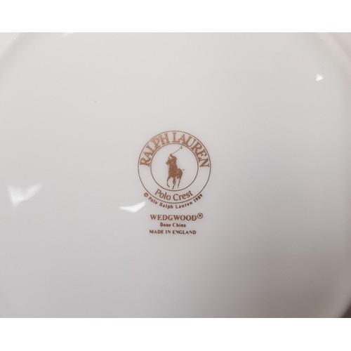 283 - Pair of Wedgwood Polo Ralph Lauren 1989 Polo Crest Bone China Plates 20.5cm in diameter (2).