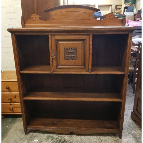 606 - An Arts & Crafts Bookcase with Small Cupboard to Upper Section. Height: 144cm