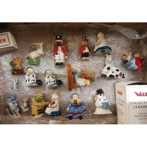 309 - A collection of Wade figures to include Looby Loo, Emily Doll, Tom & Jerry, Chuckles the clown, Pant... 