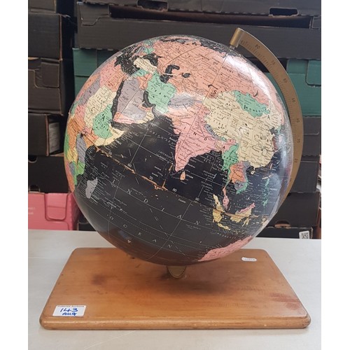 143 - Vintage globe on wooden base, 38cm in height.