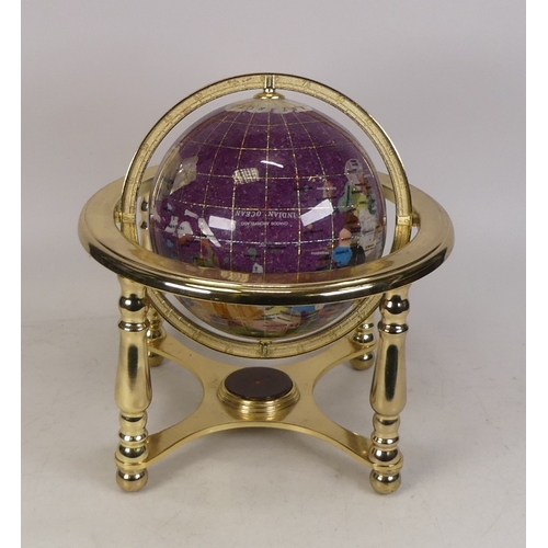 150 - A Mineral Sample Globe on a Polished Brass Coloured Stand. Height: 22cm