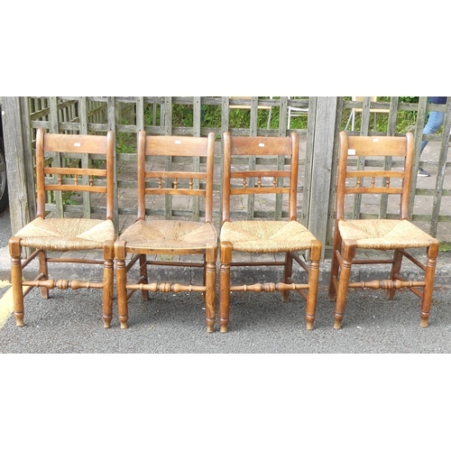 611 - A Set of Four Victorian Elm Rush Seated Chairs. Signs of wear and use. Height: 86cm (4)