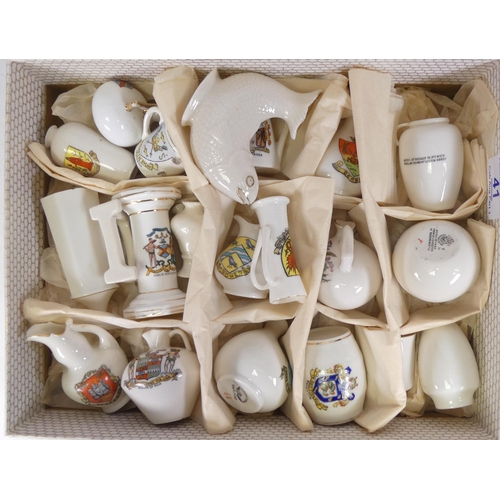 41 - A collection of crested ware to include W H Goss, Arcadian , vases, fish jugs etc ( 1 tray)