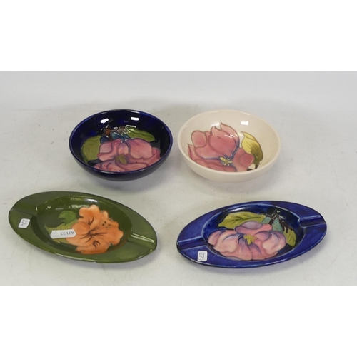 274 - Moorcroft Hibiscus ashtray together with 2 Magnolia bowls and Magnolia ashtray (4)