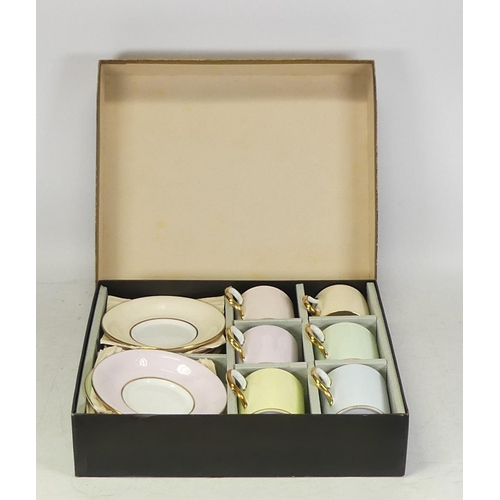 278 - Boxed set of coffee cans & saucers by Royal Chelsea.