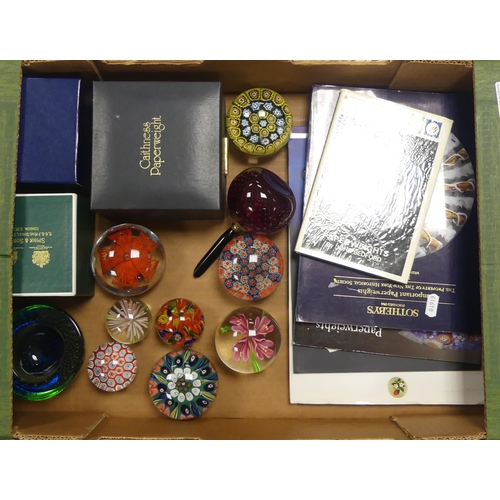 62 - A collection of glass paperweights to include Caithness, Murano etc together with Sotherbys catalogu... 