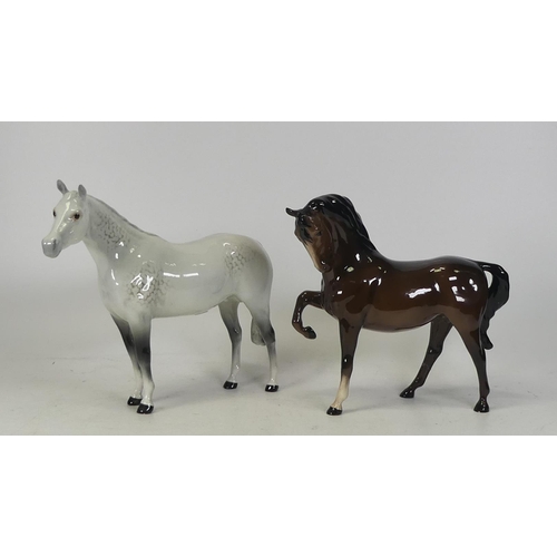 306 - Beswick brown head tucked pony (leg reglued, small chip to hoof)  and grey facing left mare (2)