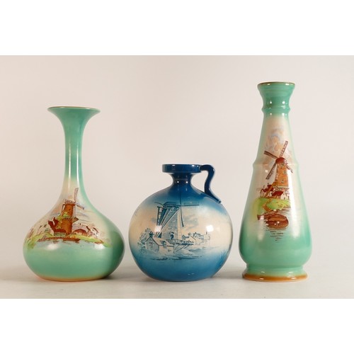 319 - Wileman & Co. Faience vases x 2 (h21cm and 25cm) together with a small handled jug h14cm. All depict... 