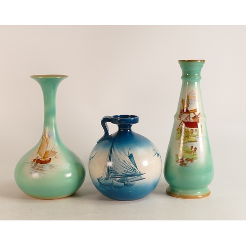 319 - Wileman & Co. Faience vases x 2 (h21cm and 25cm) together with a small handled jug h14cm. All depict... 