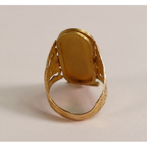 801 - Yellow metal Egyptian ring, tested to be 15ct or higher carat,4.5g.