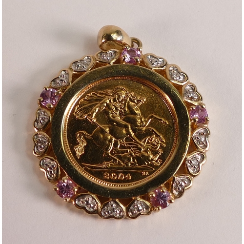 802 - Gold half Sovereign dated 2004, mounted in pink & white stone set hearts 9ct gold mount, 9.7g.