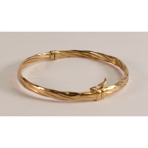 804 - 9ct gold bangle, 4.4g.