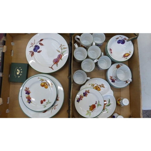 395 - A large collection of Royal Worcester Evesham Vale tea and dinner ware to include 7 dinner plates, 4... 