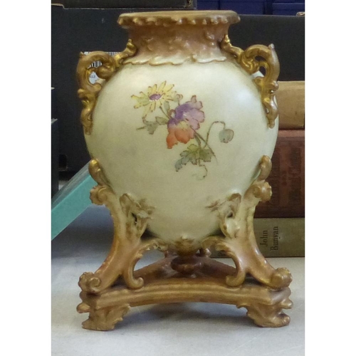 397 - Royal Worcester hand painted urn (lid absent) on tri form base marked to underside 7653 height 24cm