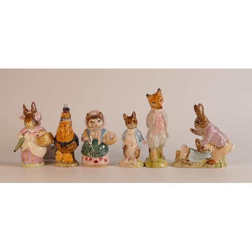 203 - A collection of Beswick Beatrix Potter BP3 to include   Mrs Rabbit, Mr Benjamin Bunny, Foxy Whiskere... 