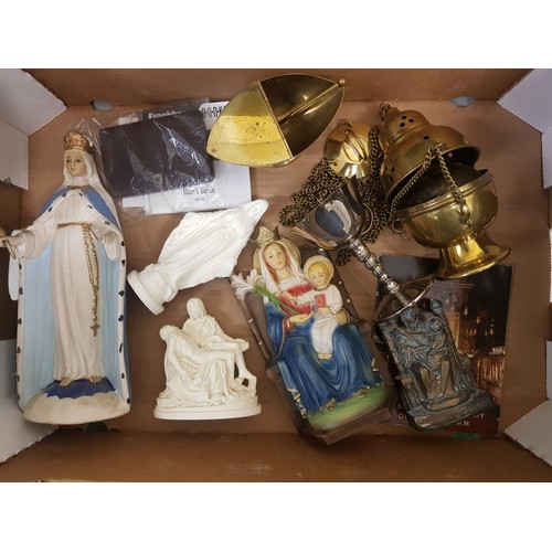 61 - A mixed collection of religious items to include a brass Thurible, resin religious figures and a poc... 