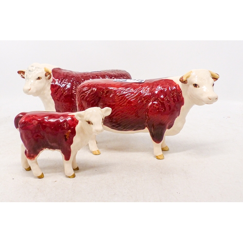 495 - Beswick Hereford Cattle Family including Bull, Cow and Calf (3)