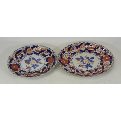 211 - Two Japanese Imari scalloped dishes chips to rims