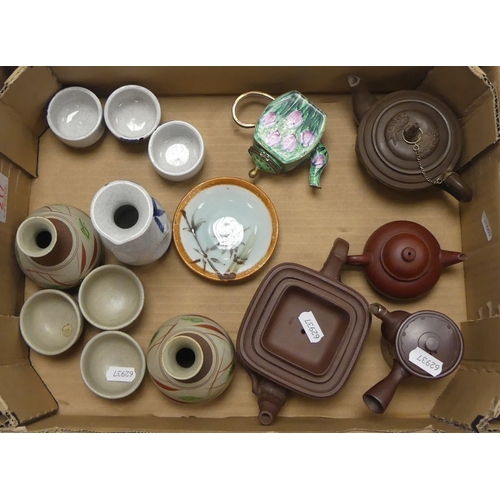 217 - Mixed collection of ceramics to include two clay tea pots, Sake sets, Kelvin Chen enamel tea pot