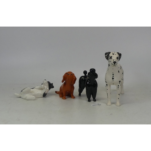 488 - Beswick selection of Three Dogs including A Black & White  Submissive Dog, Black Gloss Poodle No.138... 