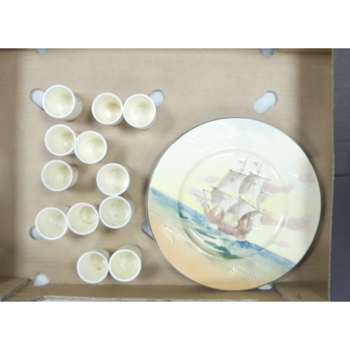 46 - A Collection of 12 Royal Doulton Bunnykins Beatrix Potter Egg Cups and two Famous Ships Victory and ... 