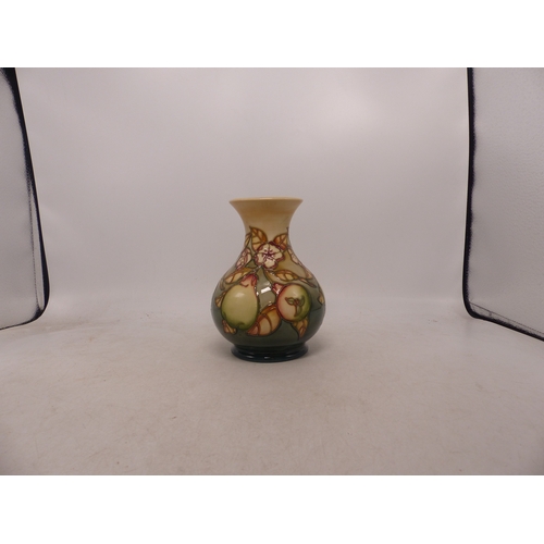 142 - Boxed Moorcroft Pears Design Vase. Height: 15cm