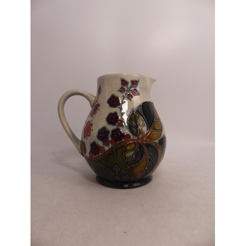 412 - Moorcroft Brambly Design Jug. Monogrammed WM to base. Height: 14.5cm