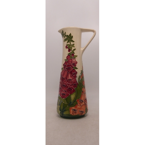 45 - Boxed Moorcroft Amberwood Design Jug. Height: 24cm