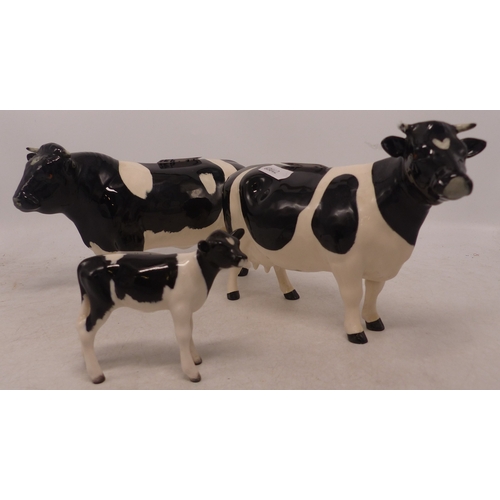 494 - Beswick Fresian Cattle Family including Bull, Cow and Calf (3)