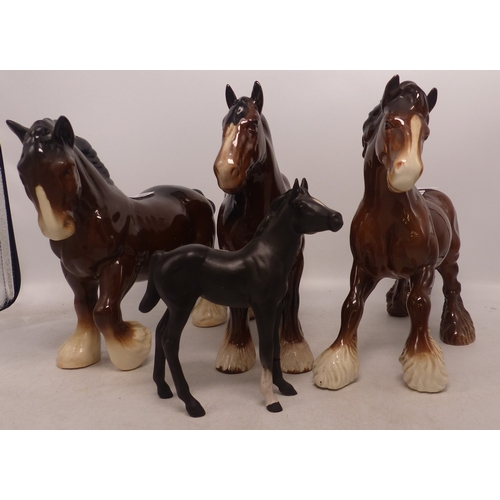 500 - Four Horses to include Royal Doulton Brown Shire Horse, unmarked Action and Cantering Shires and a B... 