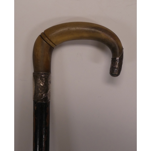 41 - A Wooden Walking Stick With A Silver Collar And Horn Handle