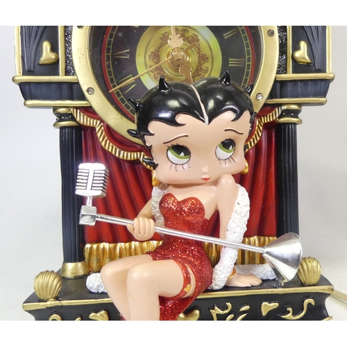 81 - Two Collectible Clocks to include Betty Boop and Disney example with Fairies Series Miniature Figure... 