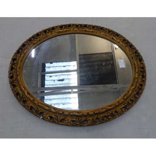 296 - Reproduction Gilt Frame Oval Wall Mirror. Height: 59.5cm