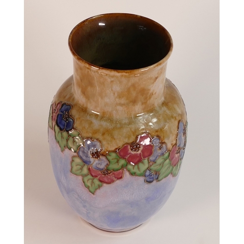 110 - Royal Doulton Lambeth Stoneware Vase with floral decoration in polychrome colours. Height: 28.5cm