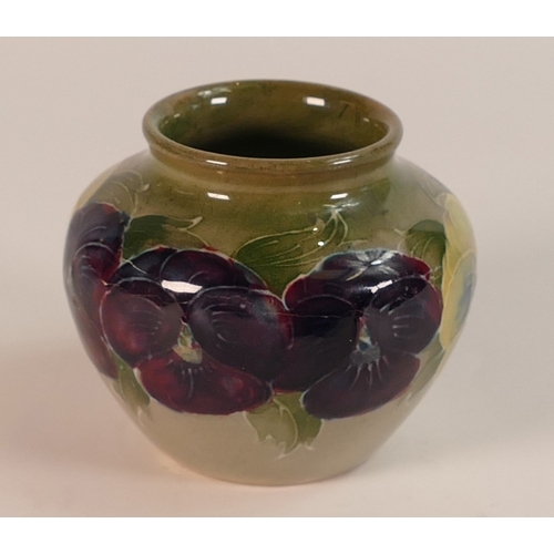 125 - William Moorcroft, Small Vase in the Pansy Design on Celadon Ground c.1915. a/f. Height: 6.5cm